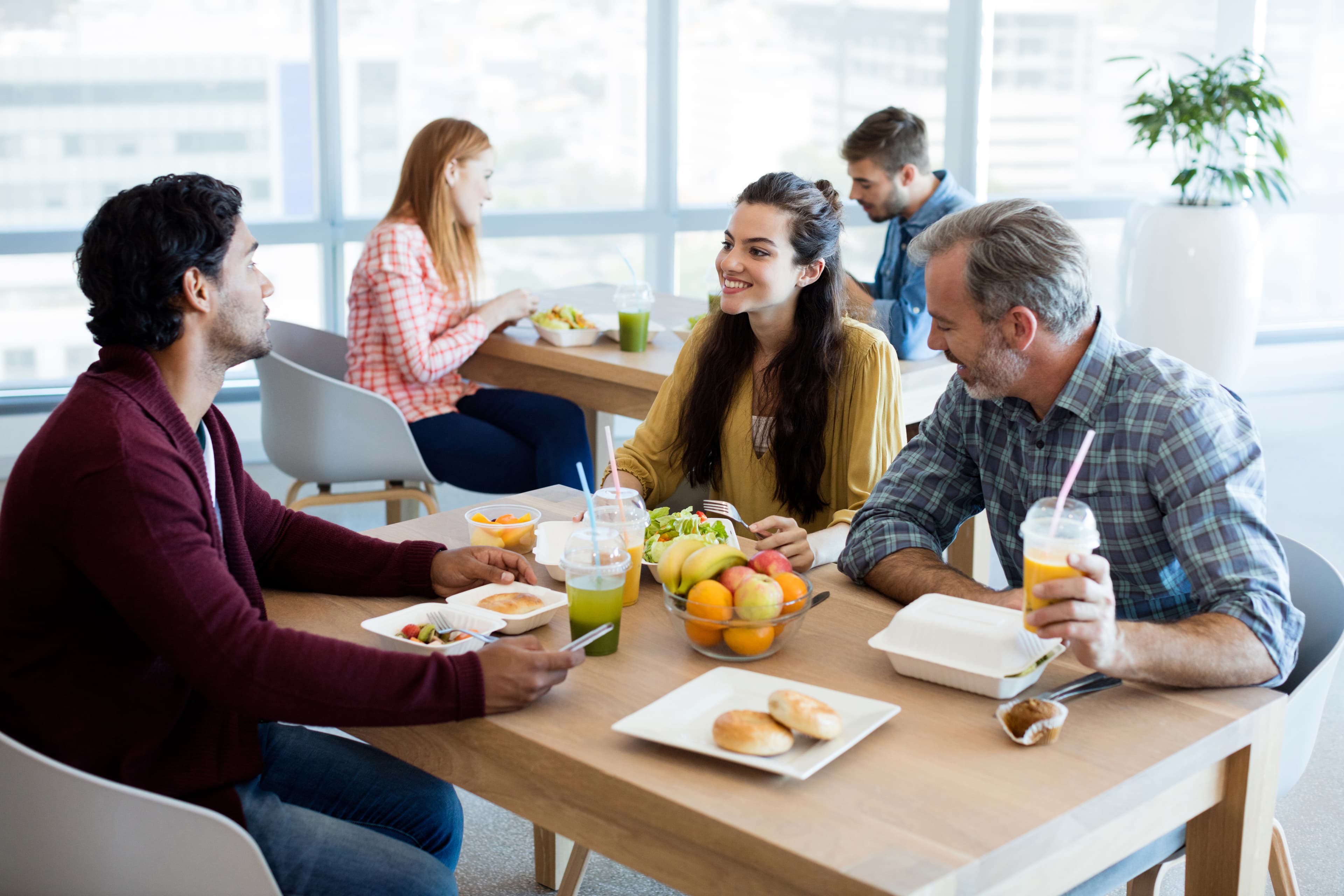 People chatting in a canteen